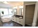 Bathroom features double vanity, soaking tub, and walk-in closet at 121 Silver Fox Ct, Mount Holly, NC 28120