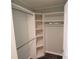 Well-organized walk-in closet featuring built-in shelving and ample hanging space at 121 Silver Fox Ct, Mount Holly, NC 28120