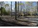 Home exterior with well-kept lawn and landscaping at 121 Silver Fox Ct, Mount Holly, NC 28120