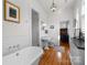 Bright bathroom with a standalone tub, glass-enclosed shower and classic fixtures at 1212 Queens Rd, Charlotte, NC 28207