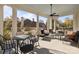 Outdoor seating with a ceiling fan, white columns, and furniture at 1212 Queens Rd, Charlotte, NC 28207