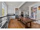 Spacious kitchen with stainless steel appliances, a large island, and built-in shelving at 1212 Queens Rd, Charlotte, NC 28207