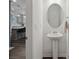 Stylish bathroom featuring a pedestal sink and modern fixtures at 124 Benford Dr, Troutman, NC 28166