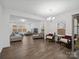 Open living room featuring recessed lighting, and hardwood floors at 124 Benford Dr, Troutman, NC 28166