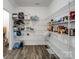 Walk-in pantry with ample shelving for storage, keeping your kitchen organized and clutter-free at 124 Benford Dr, Troutman, NC 28166