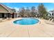 A resort-style community pool with ample seating, perfect for relaxation and socializing at 12424 Bradford Park Dr, Davidson, NC 28036