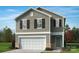 Charming two-story home featuring neutral siding, black shutters, and a two-car garage at 135 Bellina Dr # 36, York, SC 29745