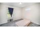 Bedroom with gray carpet and a window at 1436 Yellowstone Ct, Gastonia, NC 28054