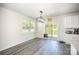 Dining room area with hardwood floors, bright light, and view to backyard at 1436 Yellowstone Ct, Gastonia, NC 28054