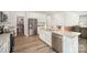 Kitchen island featuring stainless dishwasher, double basin sink, granite countertops, and seating for two at 1436 Yellowstone Ct, Gastonia, NC 28054