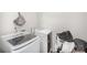 Functional laundry room with side-by-side washer and dryer and built-in shelf at 1436 Yellowstone Ct, Gastonia, NC 28054