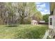 Spacious backyard featuring a trampoline, gazebo, and lush green lawn at 147 Gabriel Dr, Mooresville, NC 28115