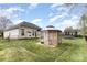 Large backyard with a gazebo, trampoline, grassy area, and fenced perimeter at 147 Gabriel Dr, Mooresville, NC 28115