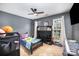 This is a spacious bedroom with a ceiling fan, natural light, and a closet at 147 Gabriel Dr, Mooresville, NC 28115