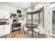Charming breakfast nook with a bay window, rustic wood paneling and a cozy, inviting atmosphere at 147 Gabriel Dr, Mooresville, NC 28115