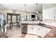 Open concept kitchen features stainless steel appliances, breakfast area, and seamlessly connects to living area at 147 Gabriel Dr, Mooresville, NC 28115