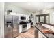 Well-equipped kitchen featuring stainless steel appliances, white cabinetry and a cozy breakfast nook with a bay window at 147 Gabriel Dr, Mooresville, NC 28115