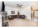 Open living room with vaulted ceilings, carpeted floors, and a large sectional sofa at 147 Gabriel Dr, Mooresville, NC 28115