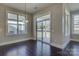 Bright dining area with large windows overlooking backyard and access to living room at 14916 Creeks Edge Dr, Charlotte, NC 28278