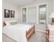 Comfortable bedroom with natural light, neutral walls, plush carpeting, and traditional decor at 15212 Keyes Meadow Way, Huntersville, NC 28078