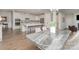 Expansive kitchen and dining area features a modern open floorplan at 15212 Keyes Meadow Way, Huntersville, NC 28078
