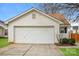 Attached one-car garage with white door and neutral vinyl siding at 1671 Sandpiper Dr, Rock Hill, SC 29732