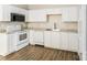 Kitchen featuring white cabinets, granite countertops, and stainless steel appliances at 1671 Sandpiper Dr, Rock Hill, SC 29732