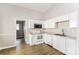 Eat-in kitchen featuring modern appliances and white cabinetry at 1671 Sandpiper Dr, Rock Hill, SC 29732