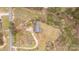 An aerial view of a house surrounded by grass and vegetation at 1853 Beach Ln, Heath Springs, SC 29058