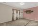 Neutral bedroom with wall-to-wall carpeting and natural light, offering a serene and comfortable atmosphere at 1853 Beach Ln, Heath Springs, SC 29058