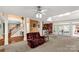 Spacious living room with high ceilings and access to the outdoor patio through sliding glass doors at 1853 Beach Ln, Heath Springs, SC 29058