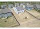 Aerial view of fenced in yard with play set, and 2021 Killian Creek Dr Denver, NC 28037 overlaid on the house at 2031 Killian Creek Dr, Denver, NC 28037