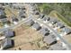 Aerial view of a residential area showcasing well-maintained homes, yards, and the surrounding neighborhood at 2031 Killian Creek Dr, Denver, NC 28037
