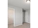 Bedroom with walk-in closet; neutral walls and carpeting at 2031 Killian Creek Dr, Denver, NC 28037