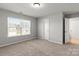 Cozy bedroom featuring natural light from a large window at 2031 Killian Creek Dr, Denver, NC 28037