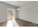 Bright dining area with glass sliding door access to the backyard at 2031 Killian Creek Dr, Denver, NC 28037