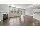 Bright living room featuring a fireplace, recessed lighting, and a door to the exterior at 2031 Killian Creek Dr, Denver, NC 28037