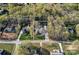 This aerial view with approximate lot lines showcases the home's position among mature trees in its neighborhood setting at 235 Stafford Estates Dr, Salisbury, NC 28146
