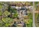 An aerial view of a home with a large yard, RV parking, and mature trees providing shade and privacy at 235 Stafford Estates Dr, Salisbury, NC 28146