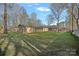 Large lot showcasing an expansive backyard with an accessory structure and outdoor entertaining spaces at 235 Stafford Estates Dr, Salisbury, NC 28146
