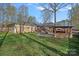 View of the backyard featuring a patio, outdoor furniture, deck, gazebo, and green lawn at 235 Stafford Estates Dr, Salisbury, NC 28146