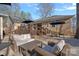 An expansive backyard with patio, deck, and a gazebo featuring an outdoor bar and seating at 235 Stafford Estates Dr, Salisbury, NC 28146