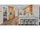 Bright kitchen with stainless steel appliances, granite countertops, and a breakfast bar with seating at 235 Stafford Estates Dr, Salisbury, NC 28146
