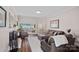 Spacious living room with hardwood floors, a fireplace, and sliding doors to an outdoor patio at 235 Stafford Estates Dr, Salisbury, NC 28146