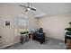 Bright home office with vaulted ceilings, large window, and functional workspace at 235 Stafford Estates Dr, Salisbury, NC 28146