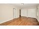 Bedroom featuring hardwood floors, natural light, and neutral paint at 2701 Rea Rd, Charlotte, NC 28226