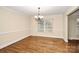 Inviting dining room with hardwood floors and a decorative chandelier at 2701 Rea Rd, Charlotte, NC 28226