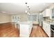 Spacious kitchen with granite countertops, stainless steel appliances, and hardwood floors at 2701 Rea Rd, Charlotte, NC 28226