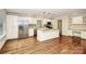 Bright kitchen with white cabinets, stainless appliances and a center island at 2701 Rea Rd, Charlotte, NC 28226