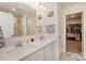 Bright bathroom featuring double sinks, white countertops, and walk-in shower at 2893 Yeager Nw Dr, Concord, NC 28027